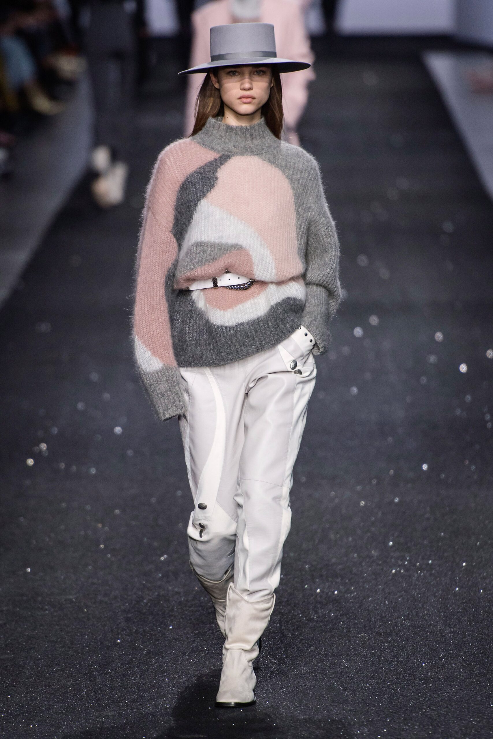 gray color-blocked sweater with white pants
