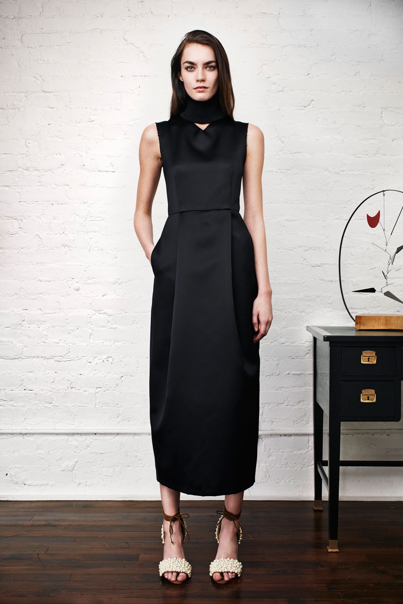 black silk sleeveless high-neck fitted a-line pockets dress