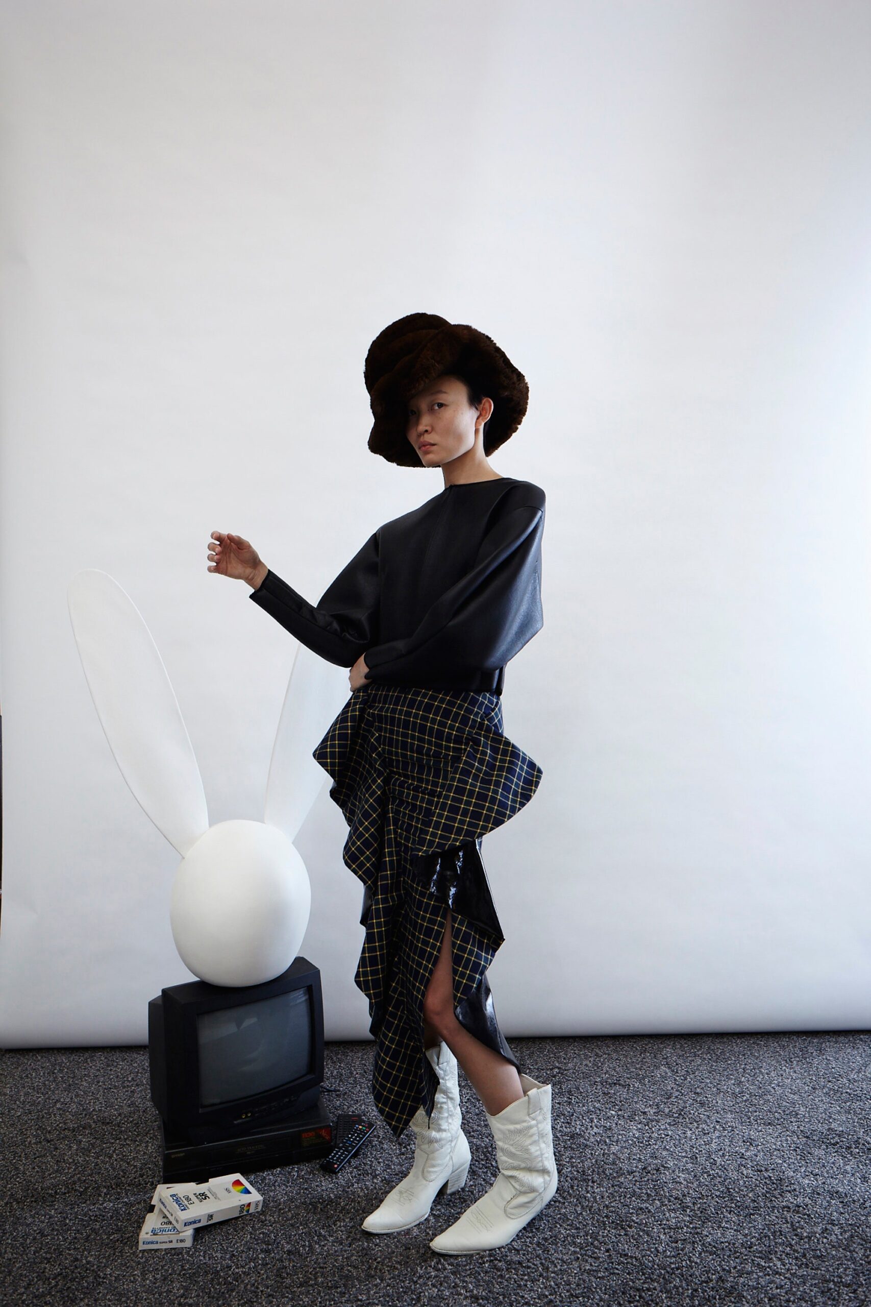 black relaxed top with asymmetric skirt