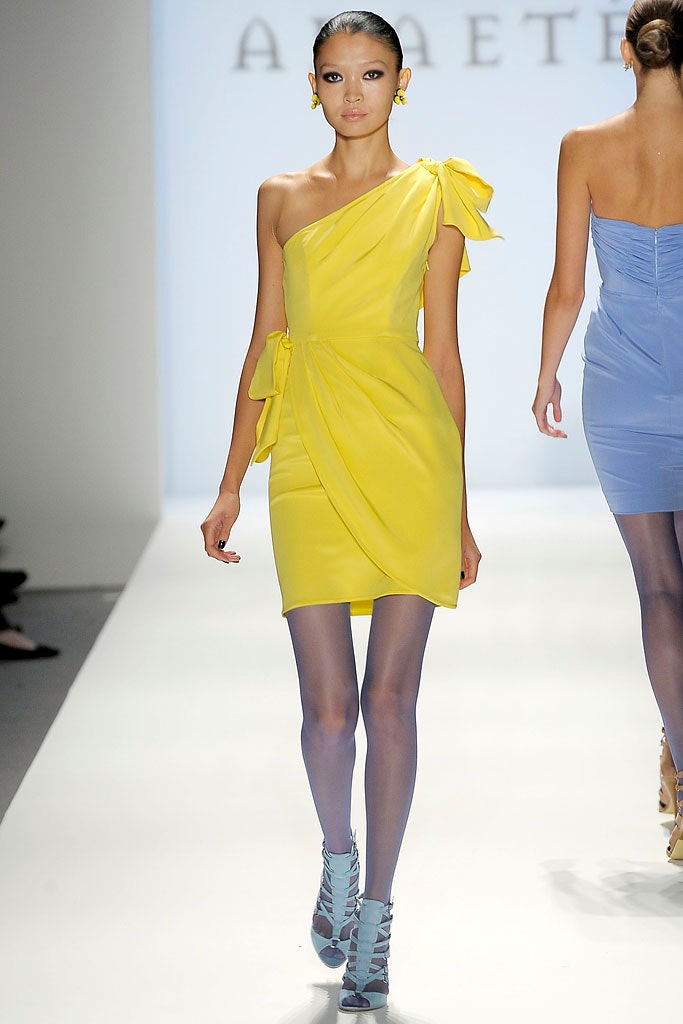 fitted yellow one-shoulder mini-dress