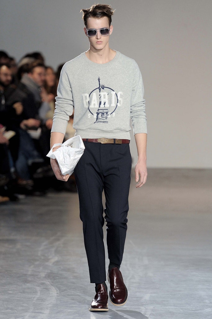 gray printed sweater with black pants