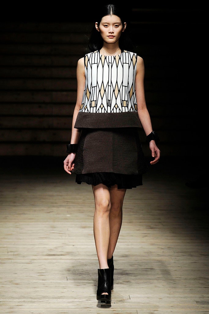 fitted black and white top with mini skirt