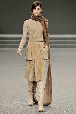 beige fitted top with tan skirt