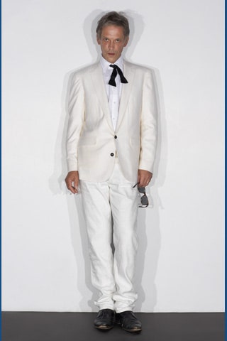 white tailored suit with black tie