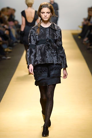 black fur coat and mini dress