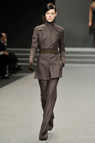 brown tailored suit with gloves