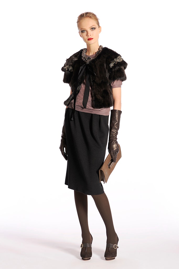 pink fitted top with black cape