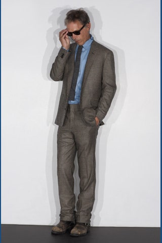 gray tailored suit with blue shirt