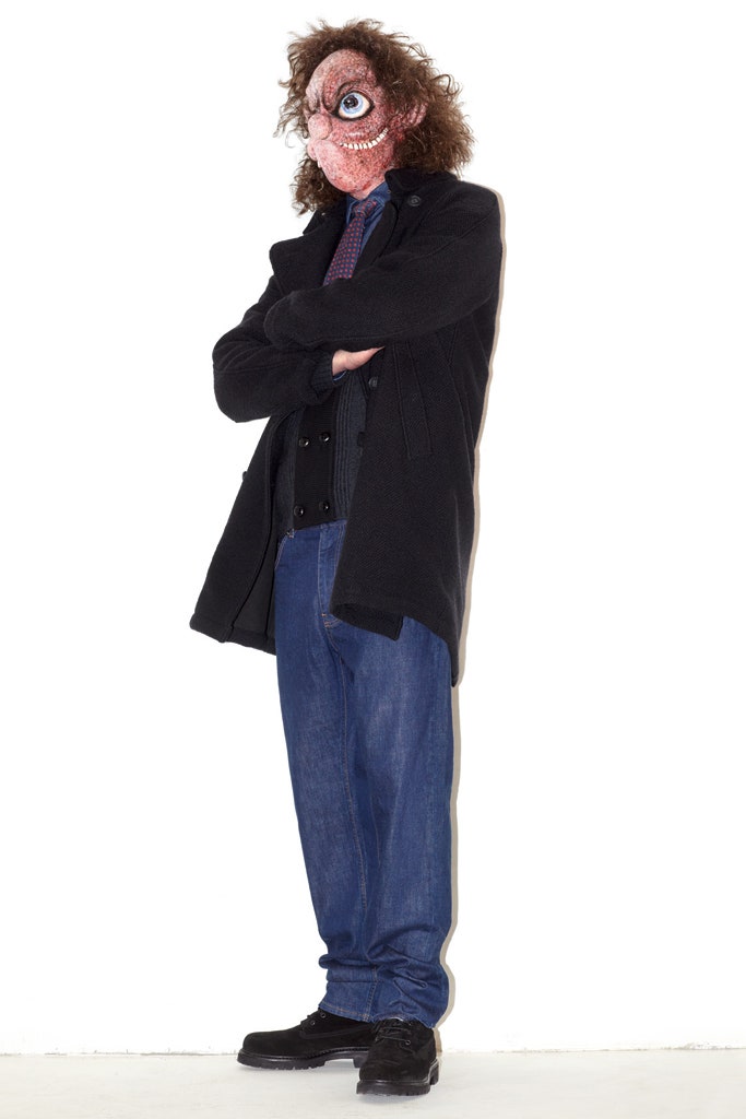 black coat with vest and jeans