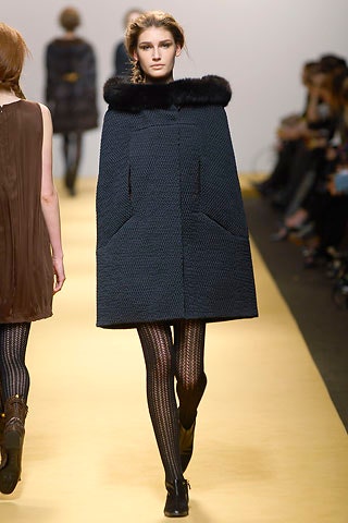 black wool cape and brown silk dress