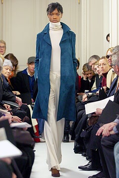 blue suede coat with white turtleneck