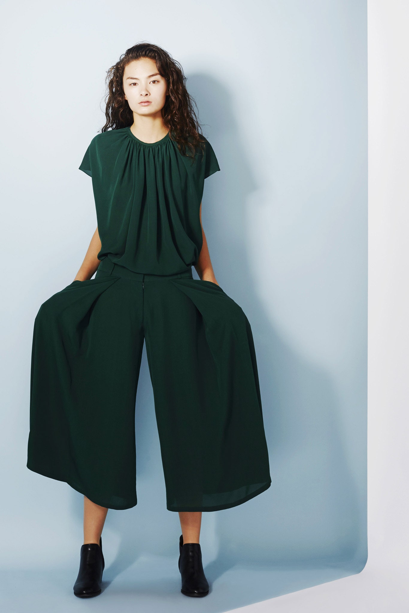 green sleeveless relaxed pleated top