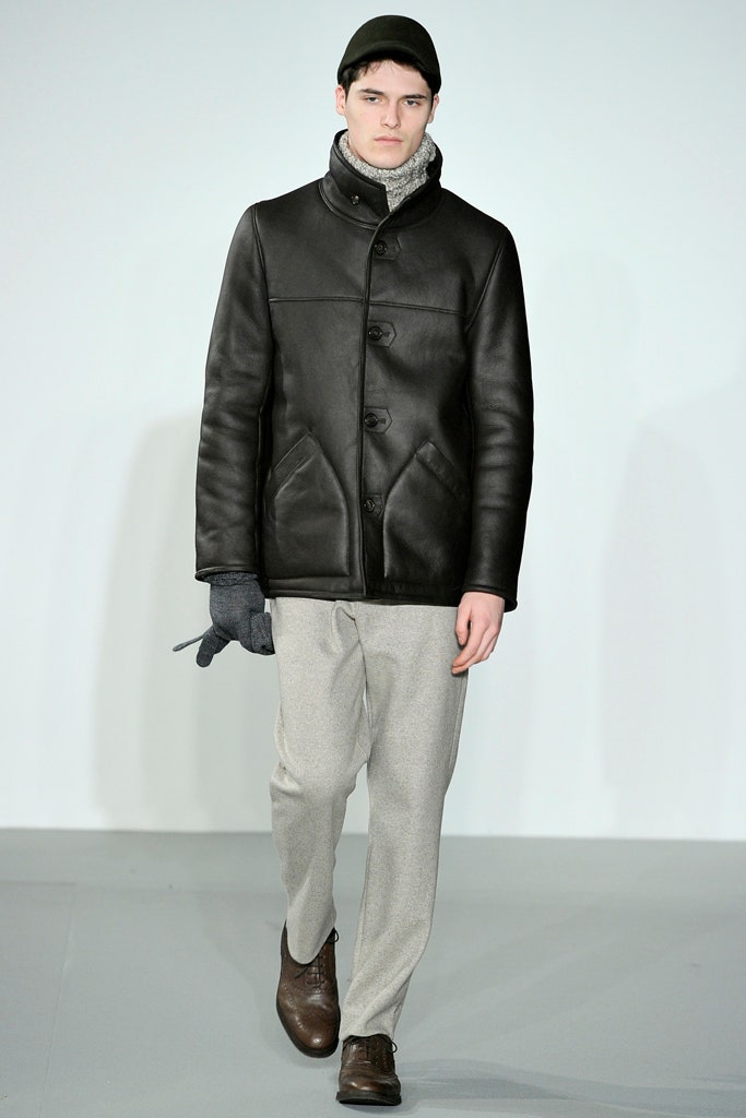 black leather jacket with gray pants