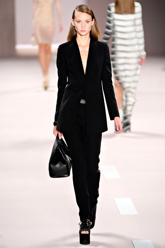 black tailored suit with bag