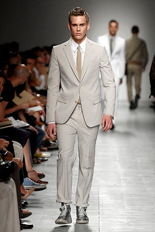 beige tailored suit with gray shoes