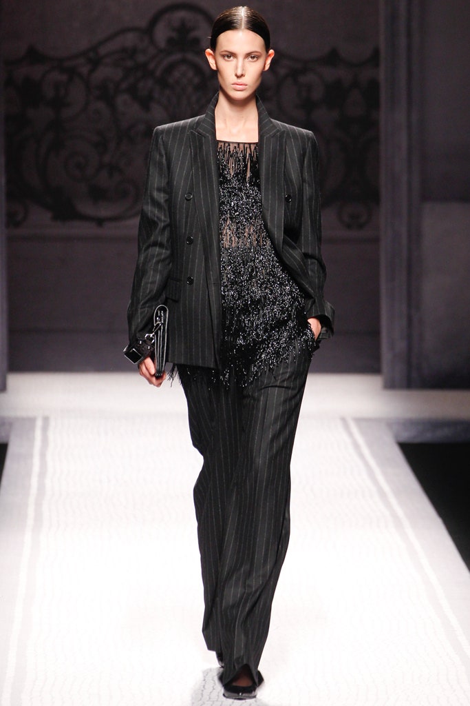 tailored black striped suit with sequined top