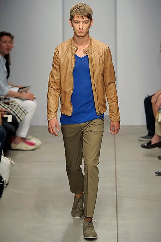 brown leather jacket with blue tank-top