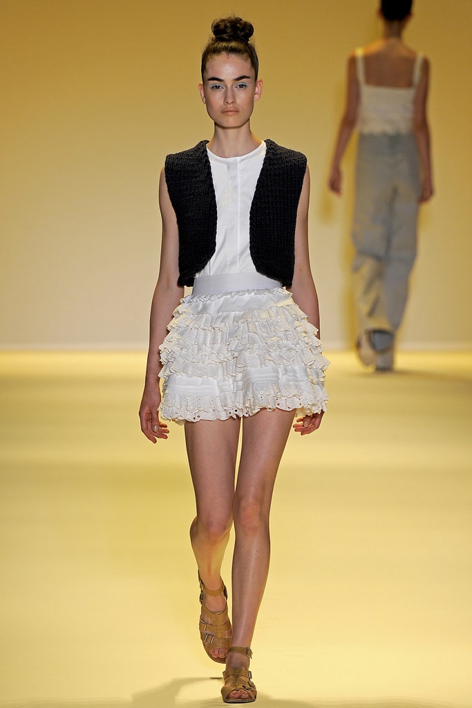 white pleated top and ruffled skirt