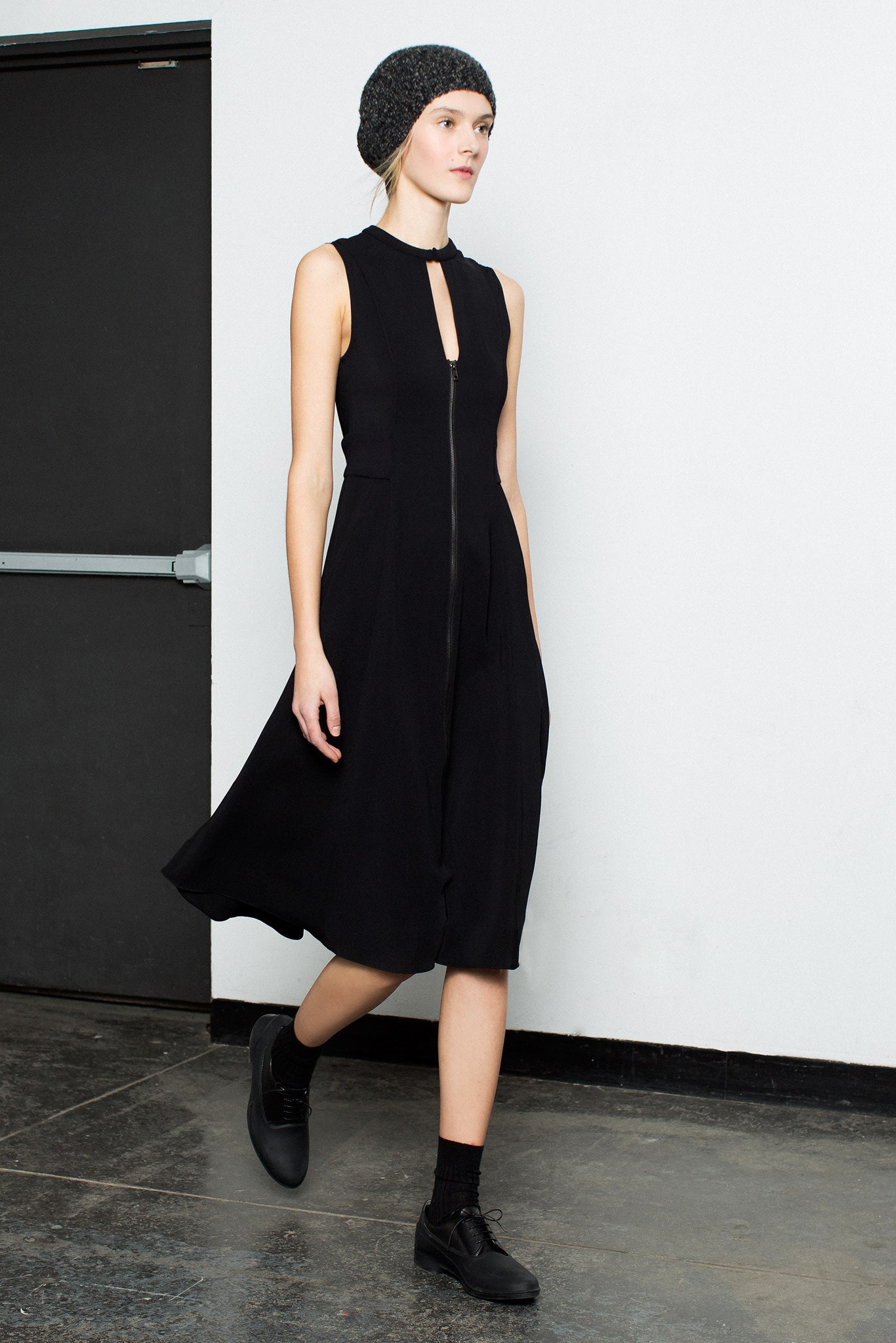 black fitted sleeveless dress