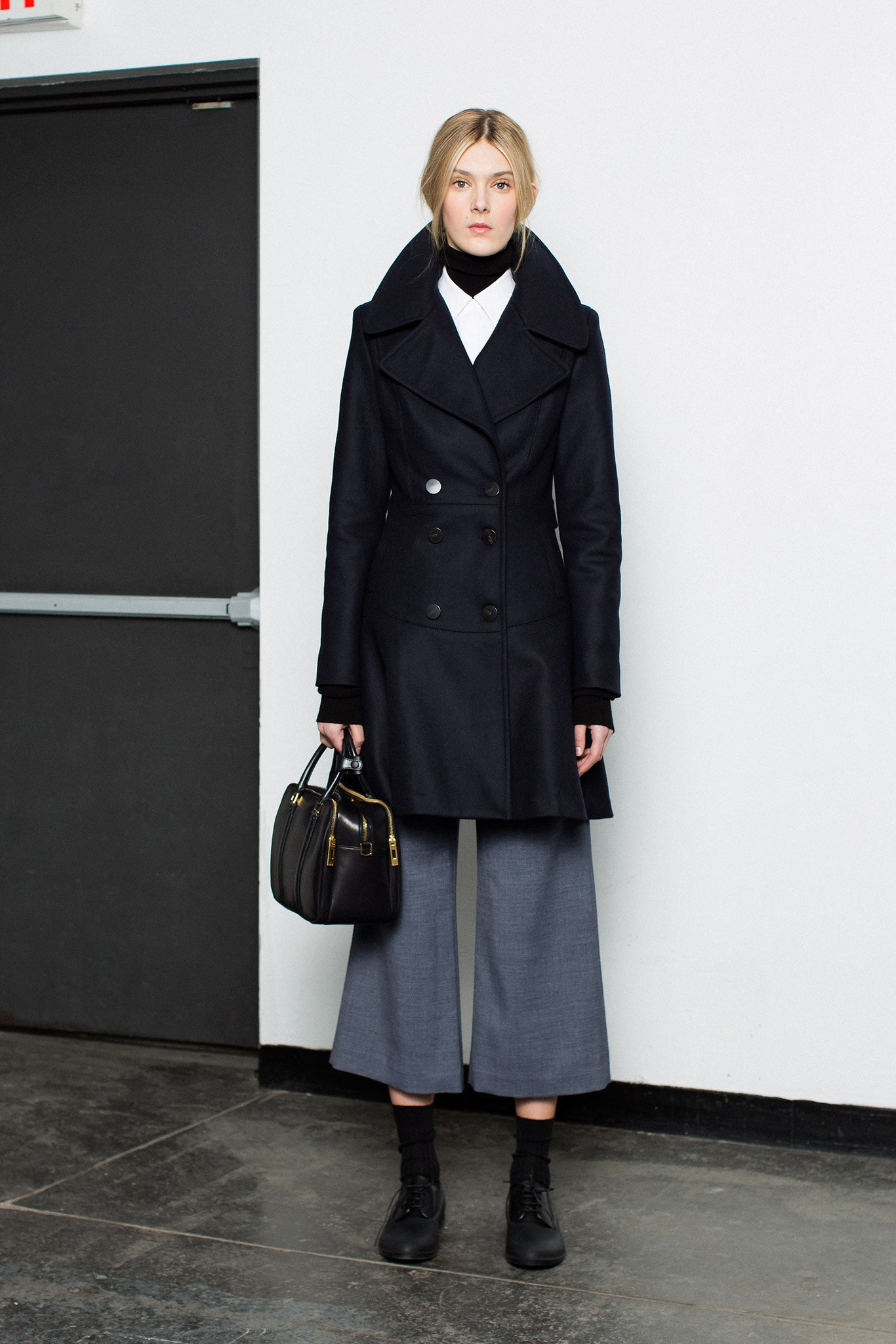 black wool tailored coat