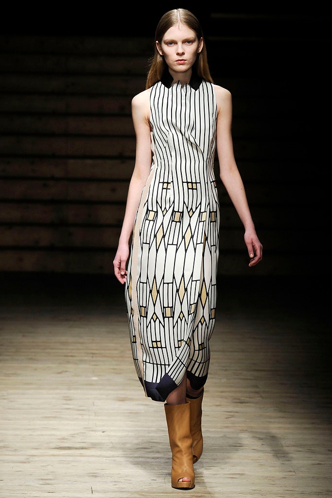 fitted white and black printed midi dress with brown boots