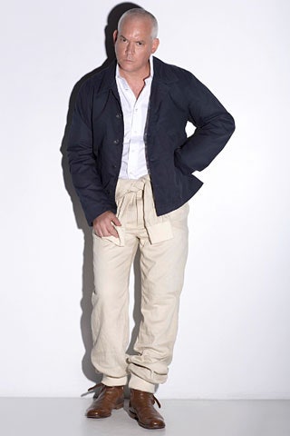 black jacket white shirt beige pants