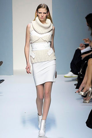 white wool sleeveless high-neck fitted layered top