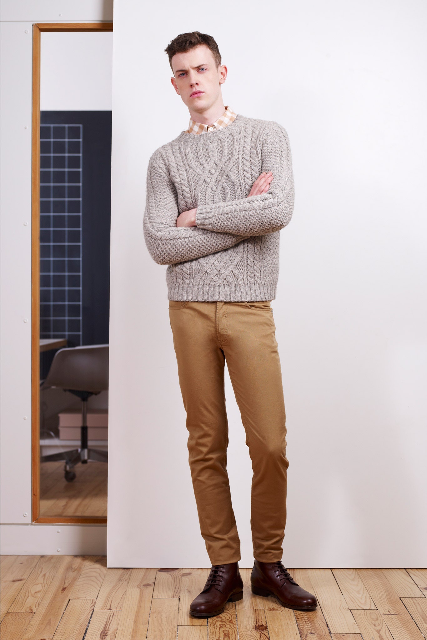 gray wool fitted sweater and beige pants