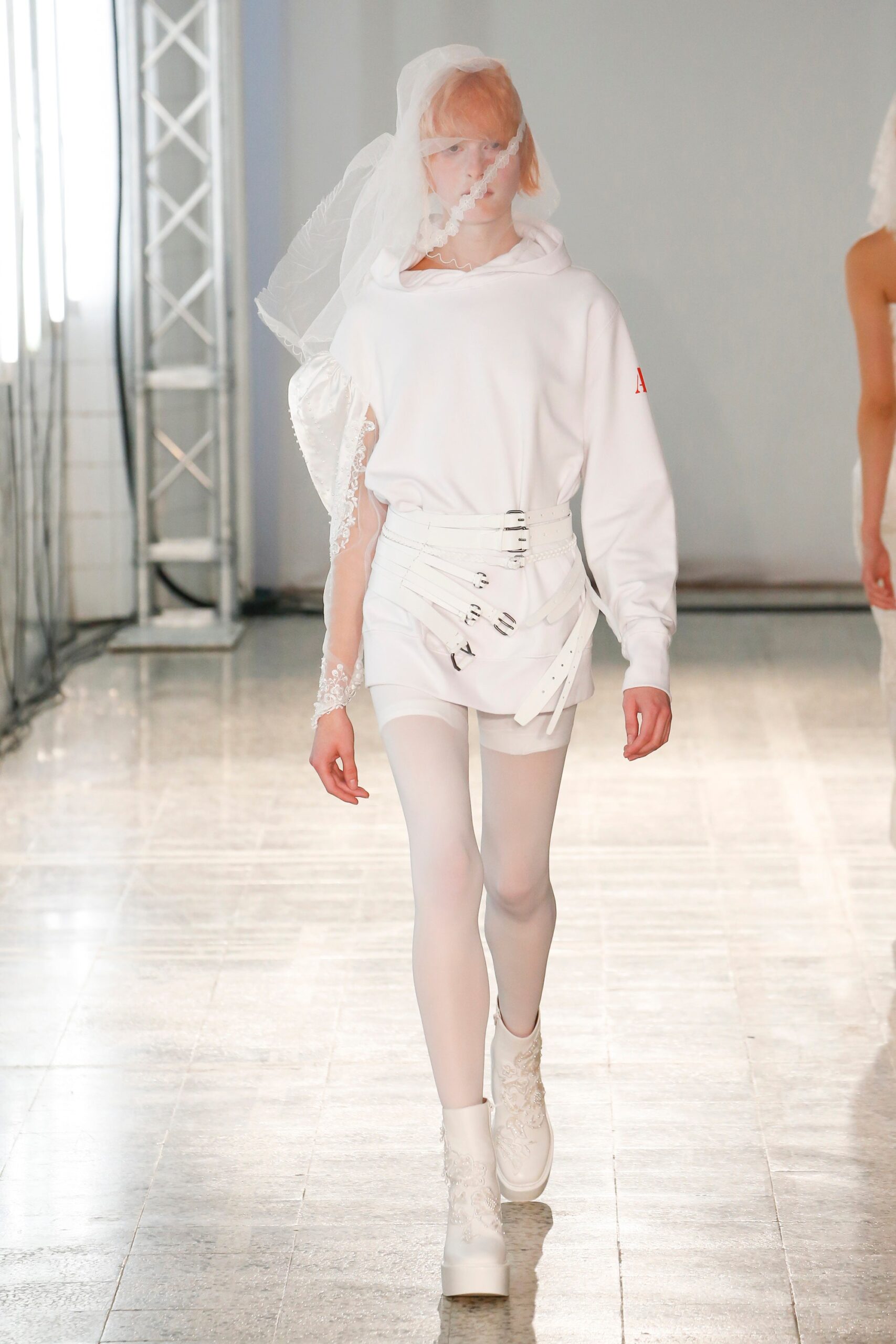 white hoodie and fitted skirt