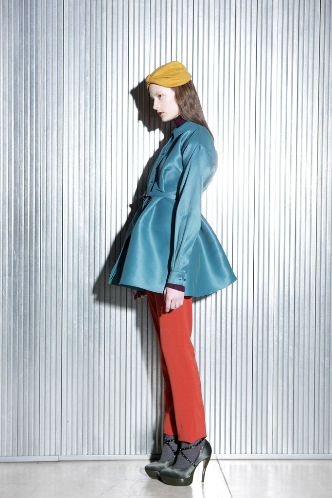 teal silk structured jacket with red pants