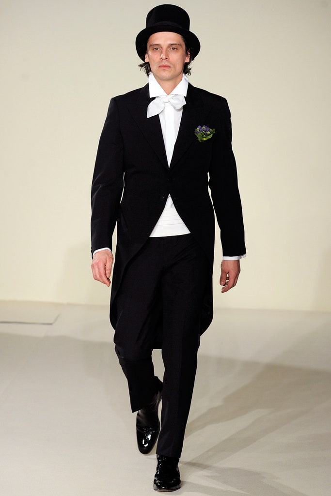 black tailored suit with white shirt