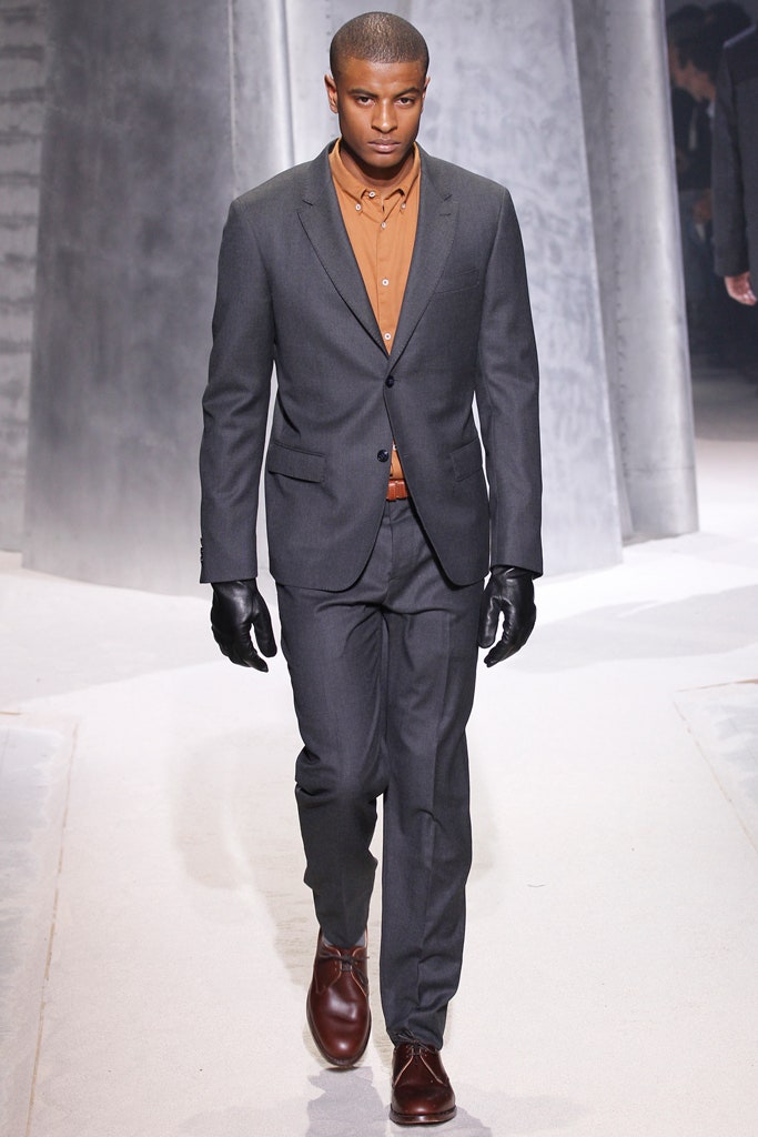 gray tailored suit with brown shirt