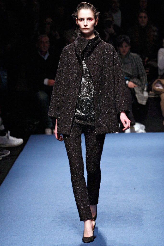black wool long-sleeve collared structured textured shiny coat