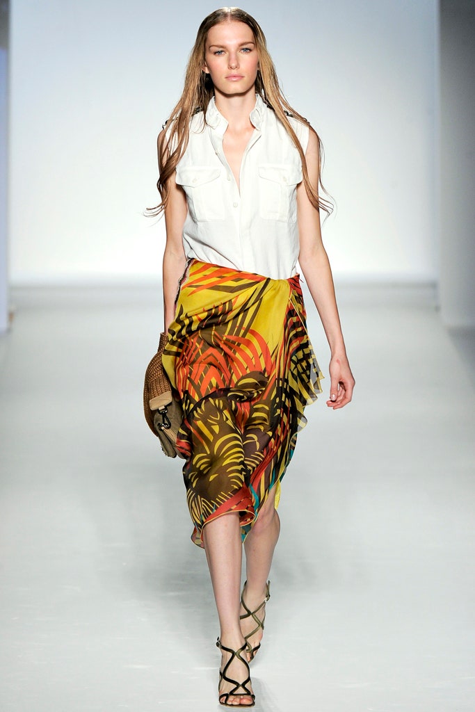 white sleeveless top with multi skirt