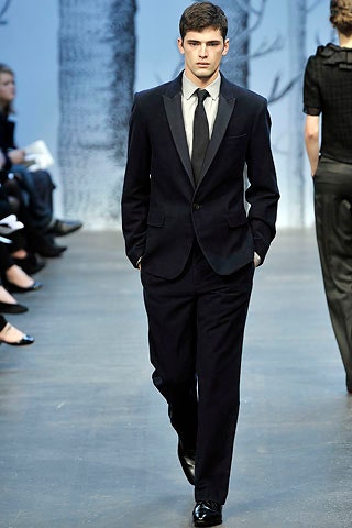 black tailored suit with tie