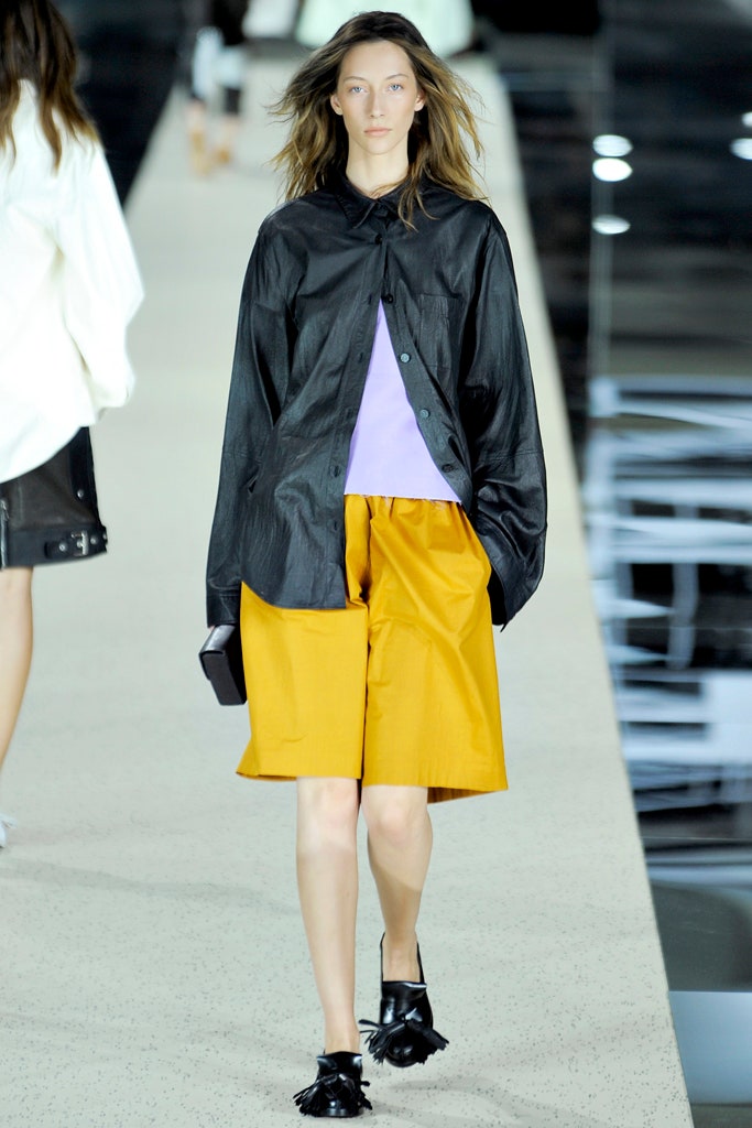 black shirt yellow shorts purple top
