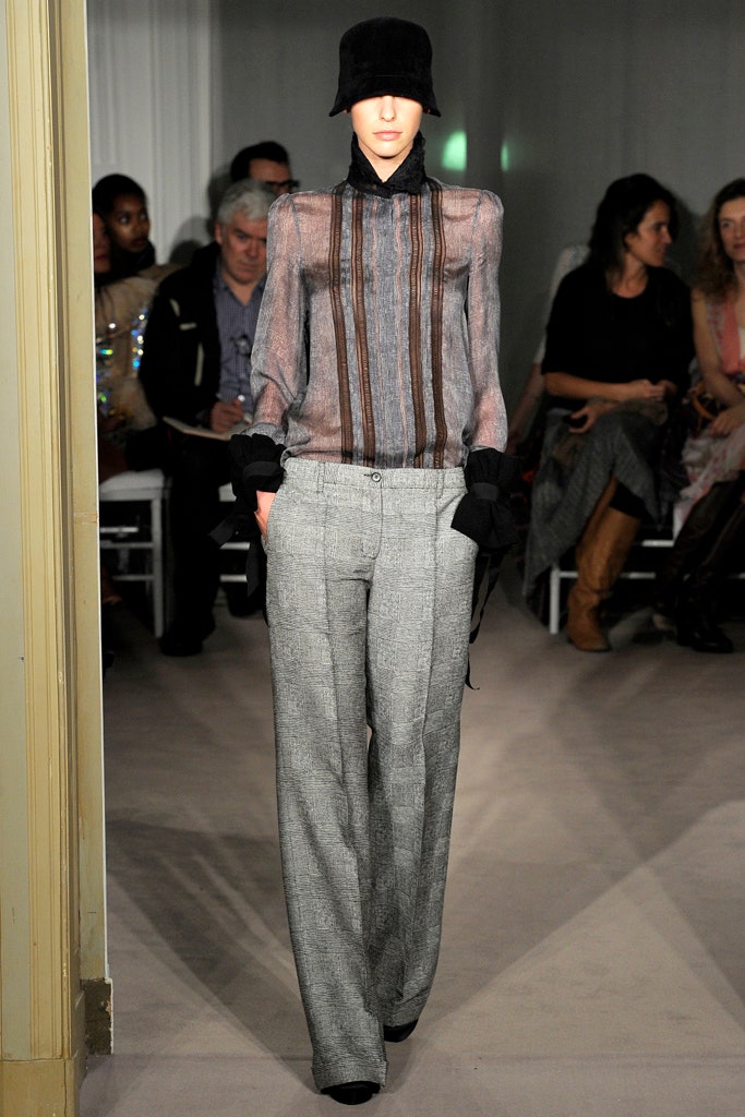 sheer black striped blouse with tailored pants