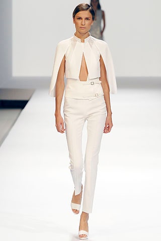 white silk sleeveless high-neck fitted draped cape