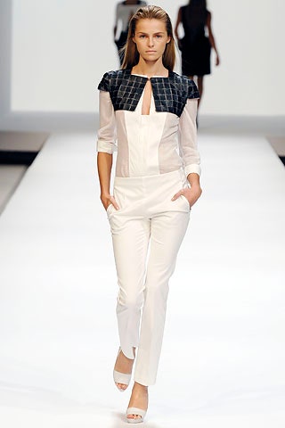 white fitted jumpsuit with black detail