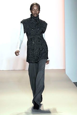 black wool long-sleeve collared fitted structured buttoned vest