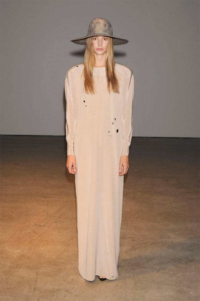 beige silk relaxed gown with gray hat