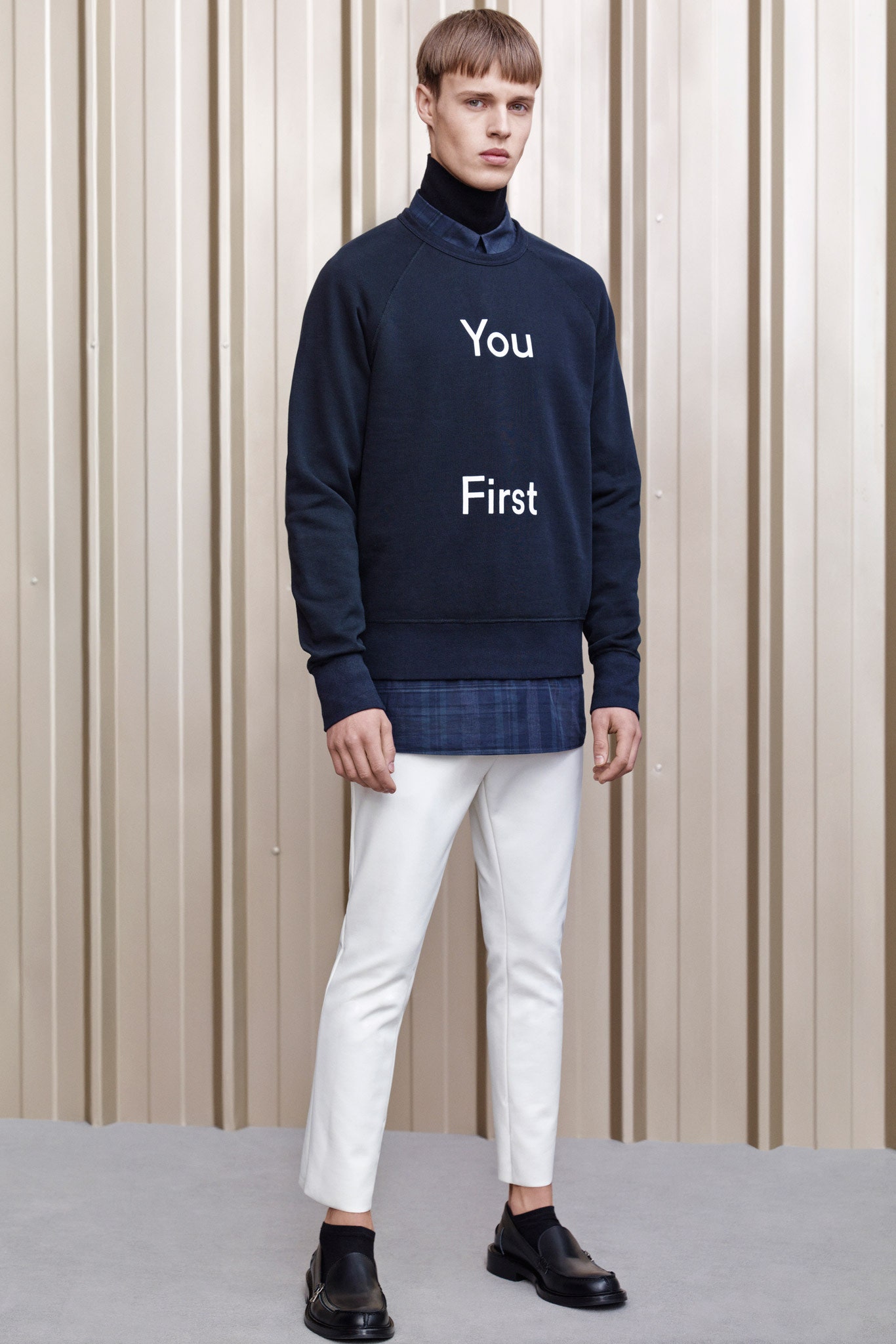 navy sweater with printed text