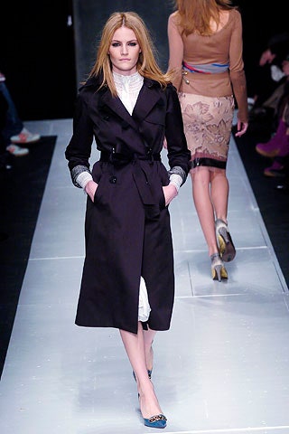 black trench coat and white dress