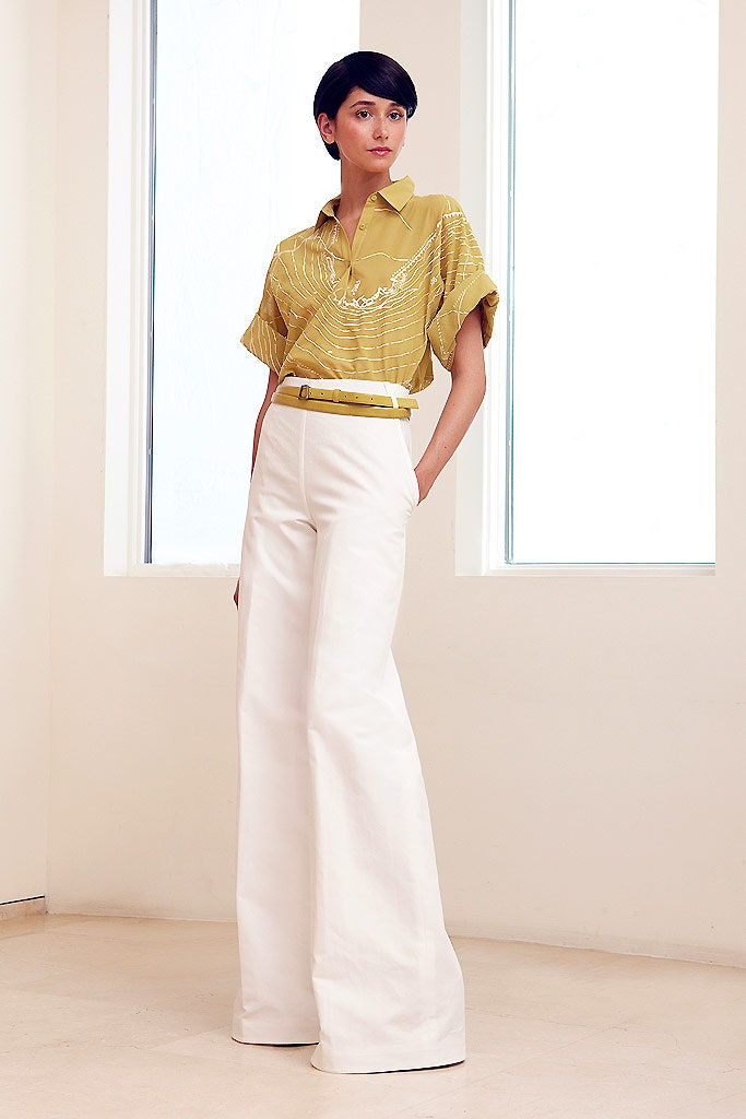 yellow printed shirt with white wide-leg pants