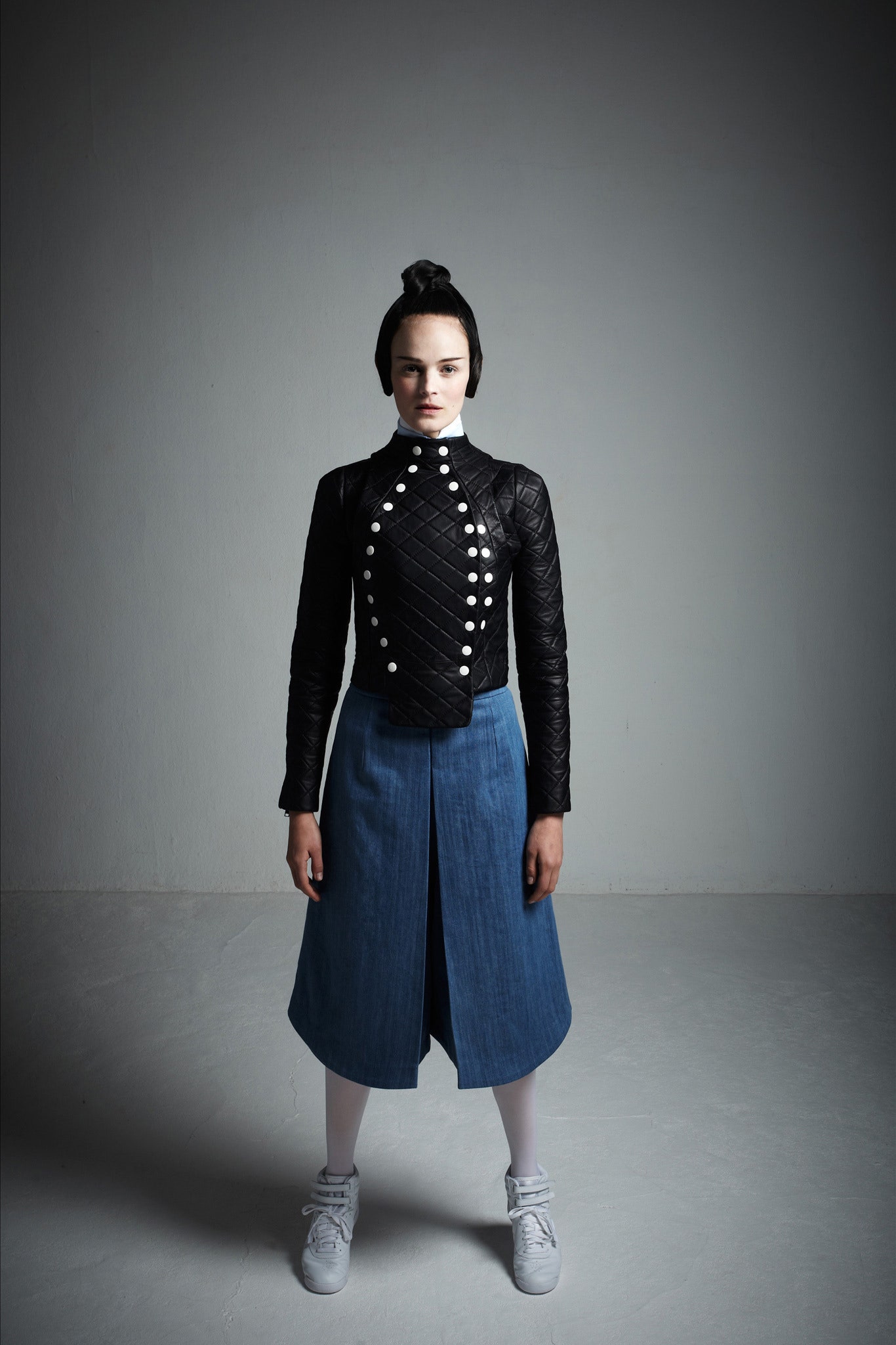 black leather jacket with blue skirt