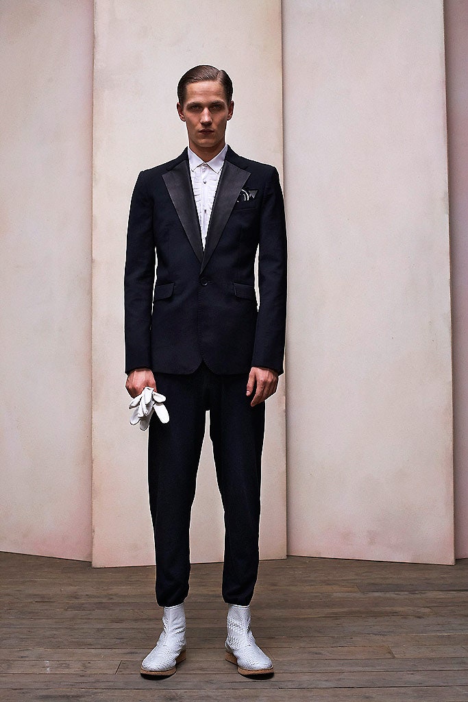 black tailored suit with white shirt