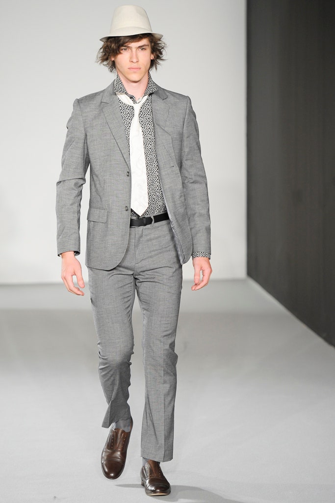 gray tailored suit with white shirt