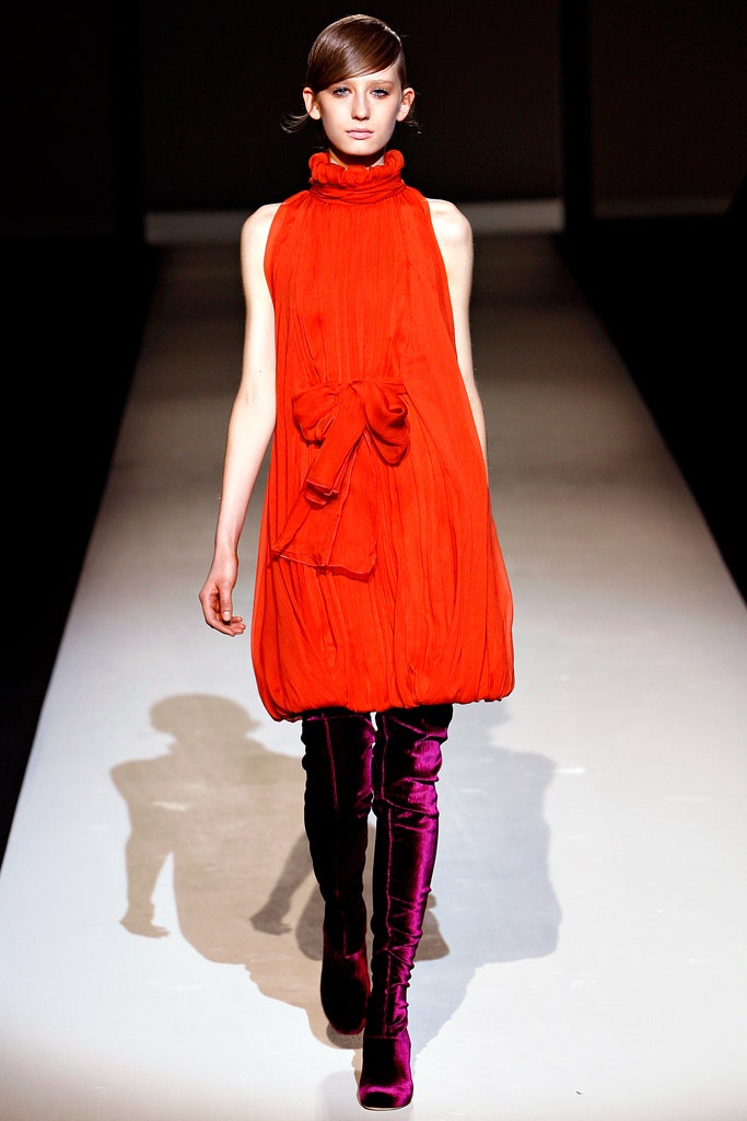 red pleated mini dress with purple boots