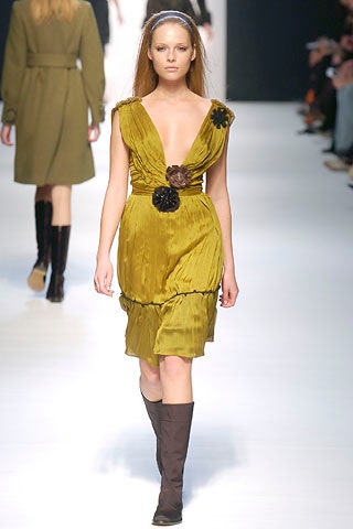 fitted green pleated dress with brown boots