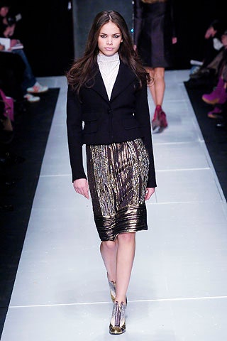 black tailored blazer with gold skirt